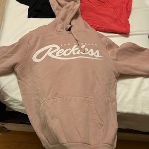 young and reckless pink hoodie